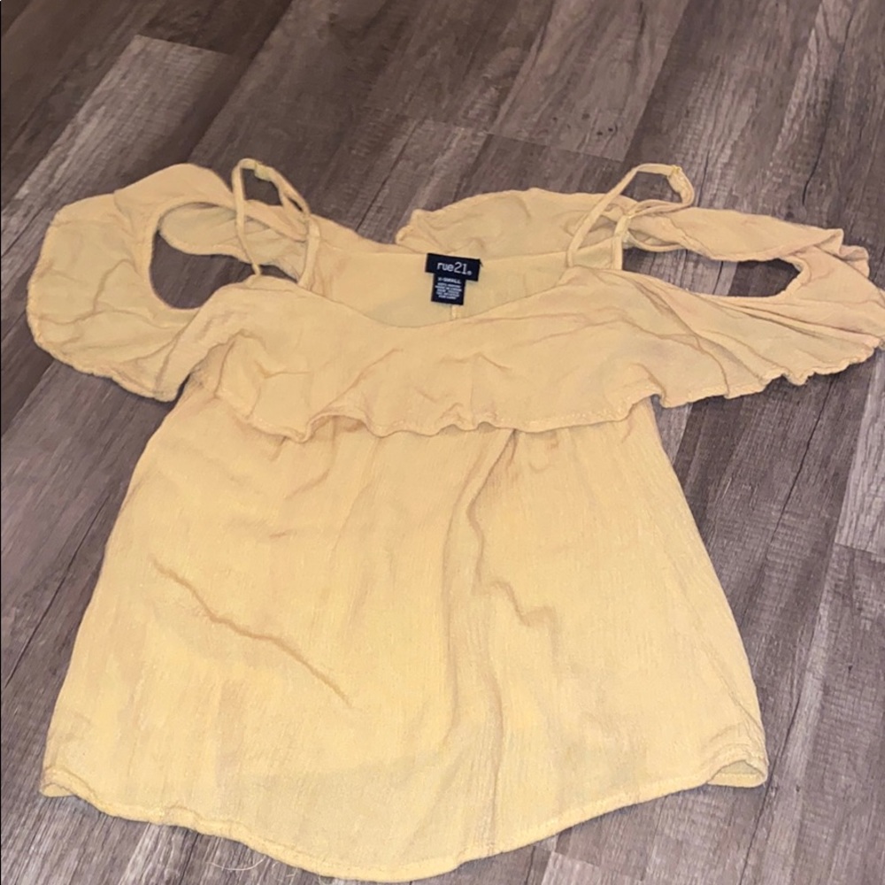 a yellow blouse